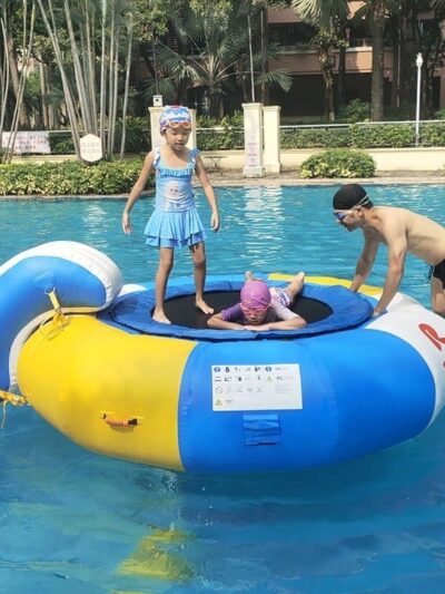 Combo bouncer aquatique avec toboggan